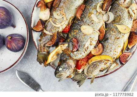 Baked rainbow trout. Baked rainbow trout. 117778982