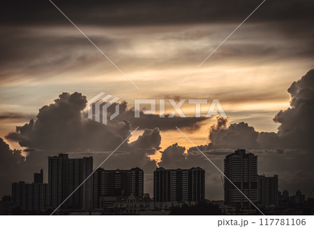 Silhouette view of Modern high-rise buildings and background of Dramatic sky in the city of Bangkok. 117781106