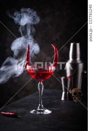 Halloween cocktail Red Devil martini 117781240