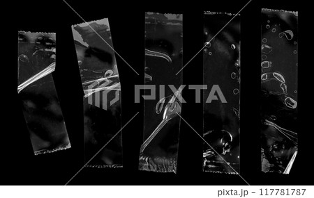 adhesive plastic tape set isolated on black background 117781787