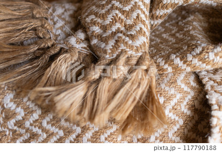 Warm wool blankets in autumn colors with rustic bangs. 117790188