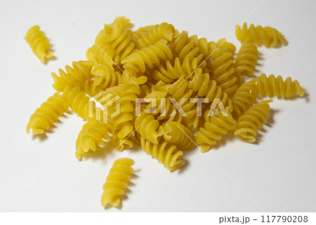 A pile of Rotini corkscrew pasta isolated on white background 117790208