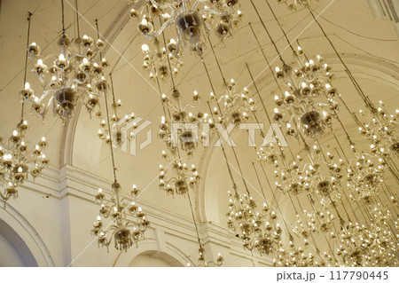 Blank porch with barrel arches and hanging chandeliers Blank porch with barrel arches and hanging chandeliers 117790445
