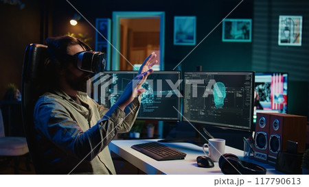 Programmer using VR headset to answer awaken AI gaining consciousness asking existential questions. Developer using virtual reality tech to chat with artificial intelligence, camera B Programmer using VR headset to answer awaken AI gaining consciousness asking existential questions. Developer using virtual reality tech to chat with artificial intelligence, camera B 117790613