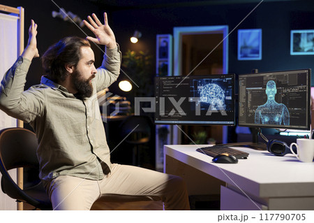 Self aware AI gaining anthropomorphic form inside cyberspace, scaring software technician jumping from chair. Artificial intelligence becoming sentient, startling IT admin raising hands in fear Self aware AI gaining anthropomorphic form inside cyberspace, scaring software technician jumping from chair. Artificial intelligence becoming sentient, startling IT admin raising hands in fear 117790705