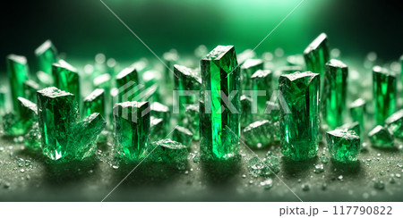 Gemstones and crystals. Emerald or tourmaline green crystals grow from black quartz fine sand. Mineral crystals in nature. illustration, background, Web banner	 117790822