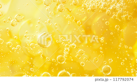 Yellow color oil bubbles background. 117792074