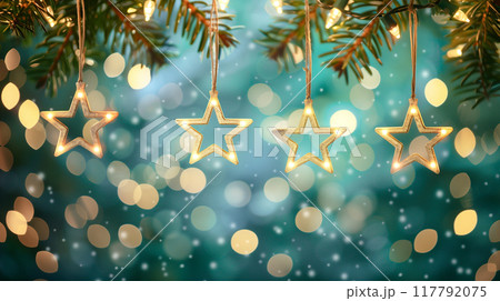 Christmas stars with light string hanging at fir branches for season greetings holiday. 117792075