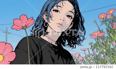コスモス畑にいる若い女性