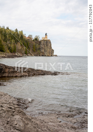 A beautiful view of Split Rock Lighthouse on the rocky coast of Lake Superior. 117792843
