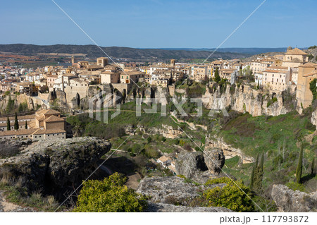 Old part of Cuenca city on rocks with hanging houses on spring day 117793872