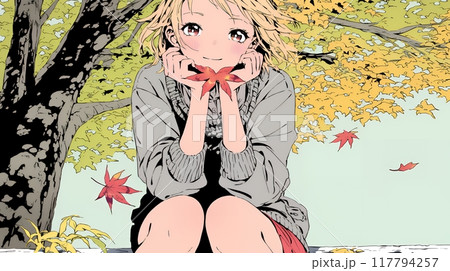 紅葉の秋の街を歩く若い女性