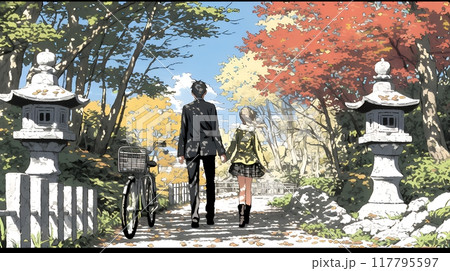 紅葉の小径を歩く若いカップル
