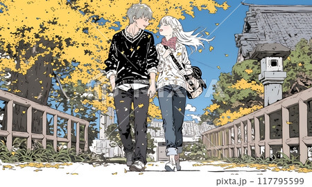紅葉の小径を歩く若いカップル