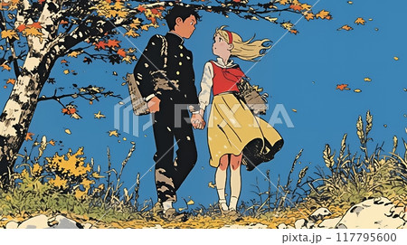 紅葉の小径を歩く若いカップル