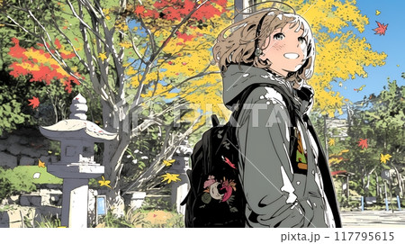 紅葉の小径を歩く若い女性