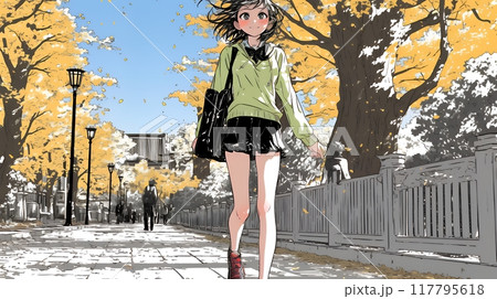 紅葉の小径を歩く若い女性