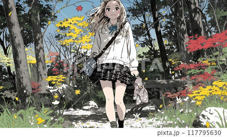 紅葉の小径を歩く若い女性