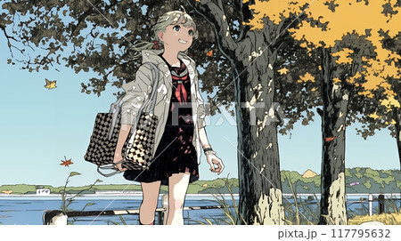 紅葉の小径を歩く若い女性