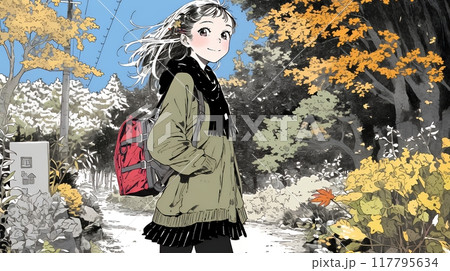 紅葉の小径を歩く若い女性