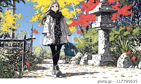 紅葉の小径を歩く若い女性
