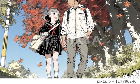 紅葉の小径を仲良く歩く少女と父親