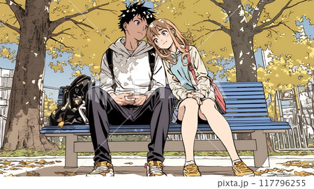 紅葉の下でいちゃついている若いカップル