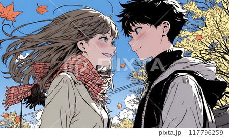 紅葉の下でいちゃついている若いカップル