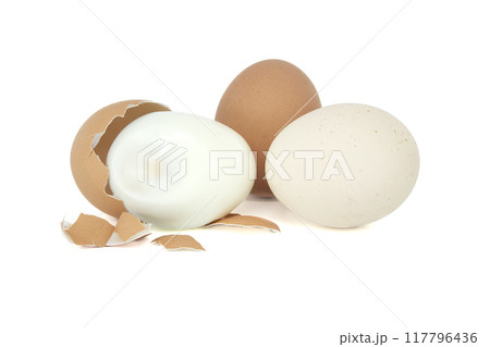 Egg in the process of being peeled, isolated on white Egg in the process of being peeled, isolated on white 117796436
