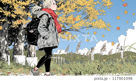 水辺の紅葉の小径を散策している若い女性