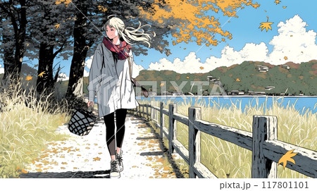 水辺の紅葉の小径を散策している若い女性