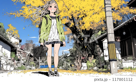 水辺の紅葉の小径を散策している若い女性