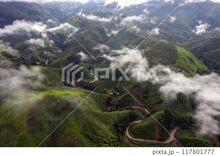 Landscape of Morning Mist with Mountain Layer at north of Thailand. mountain ridge and clouds in rural jungle bush forest Landscape of Morning Mist with Mountain Layer at north of Thailand. mountain ridge and clouds in rural jungle bush forest 117801777