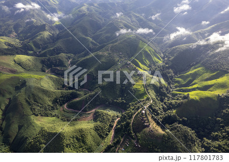 Landscape of Morning Mist with Mountain Layer at north of Thailand. mountain ridge and clouds in rural jungle bush forest Landscape of Morning Mist with Mountain Layer at north of Thailand. mountain ridge and clouds in rural jungle bush forest 117801783