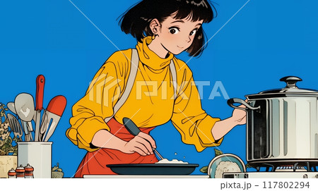 なれない料理に奮闘中の若い女性