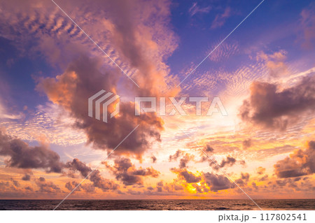 Landscape view colorful sunset or sunrise sky, Beautiful Light Sunset or sunrise over sea,Colorful clouds majestic scenery sunset Sky, Amazing clouds and waves in the ocean,Wonderful cloud background 117802541