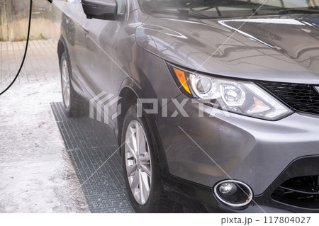 SUV Being Washed at Car Wash 117804027