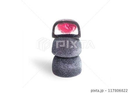 Mochi - Japanese dessert, sweets. 3 black Mochi sweets with red berry filling on top of each other isolated on a white Background Mochi - Japanese dessert, sweets. 3 black Mochi sweets with red berry filling on top of each other isolated on a white Background 117806822
