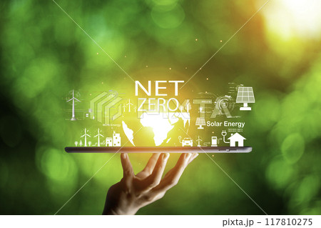 net zero concept. Hand holding bulb with net zero icon. carbon neutral concept. Dusty city environment PM 2.5 background. Climate-neutral long-term strategy. Carbon gas affects global warming.. 117810275