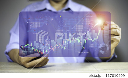 Business or trader is showing growing virtual hologram stocks, investing in trading.Business success concept . concept wealth stock investment.Business growth in the digital age. business growth. 117810409