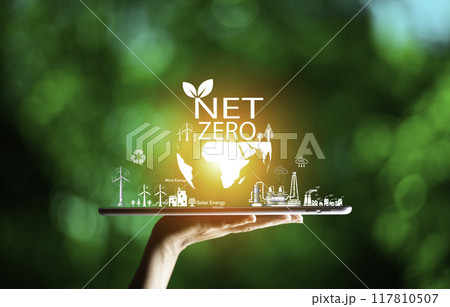 net zero concept. Hand holding city with net zero icon. carbon neutral concept. Dusty city environment PM 2.5 background. Climate-neutral long-term strategy. Carbon gas affects global warming.. 117810507