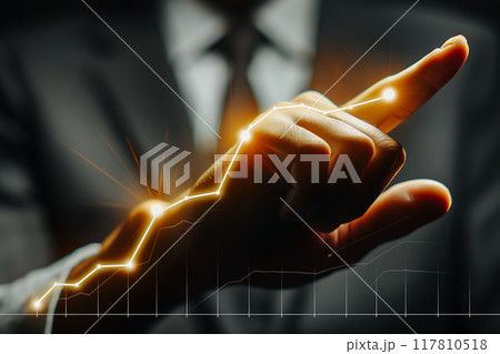 Businessman touching an upward trend line on a virtual chart. 117810518