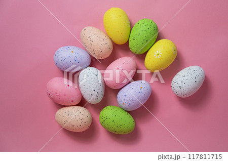 Painted quail eggs on a pink background. Easter decorations. Painted quail eggs on a pink background. Easter decorations. 117811715