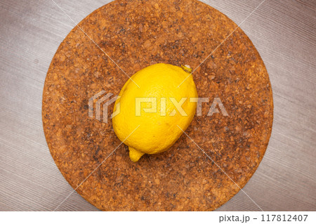 Cut lemon and lemon water on the table Cut lemon and lemon water on the table 117812407