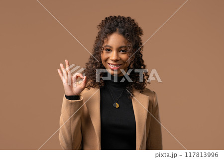Zoomer girl with OKAY sign, ok gesture. Happy lady, correct choice, great deal 117813996