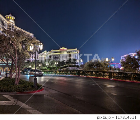 Las Vegas, USA - 08.06.2024 View of the Caesars Palace and Bellagio Hotel and casino at night. Las Vegas, USA - 08.06.2024 View of the Caesars Palace and Bellagio Hotel and casino at night. 117814311