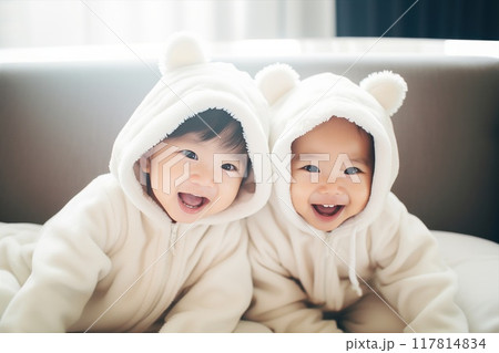 Adorable Twins Dressed in Cute Bear Costumes Spread Unmatched Joy and Happiness Around 117814834