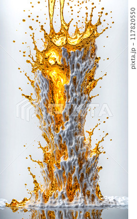 Vertical splash of white paint or milk mixed in the air with liquid gold or golden substancje. Time freeze effect Or slow motion	 117820550