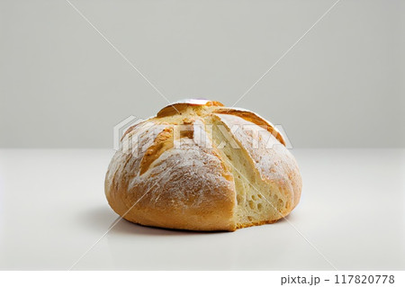Picture of a freshly baked rustic artisan bread loaf with golden crust, isolated white background Picture of a freshly baked rustic artisan bread loaf with golden crust, isolated white background 117820778