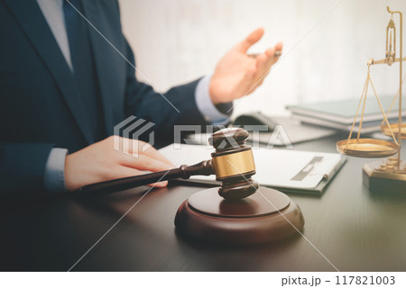 Lawyer working in the office, talking with client 117821003